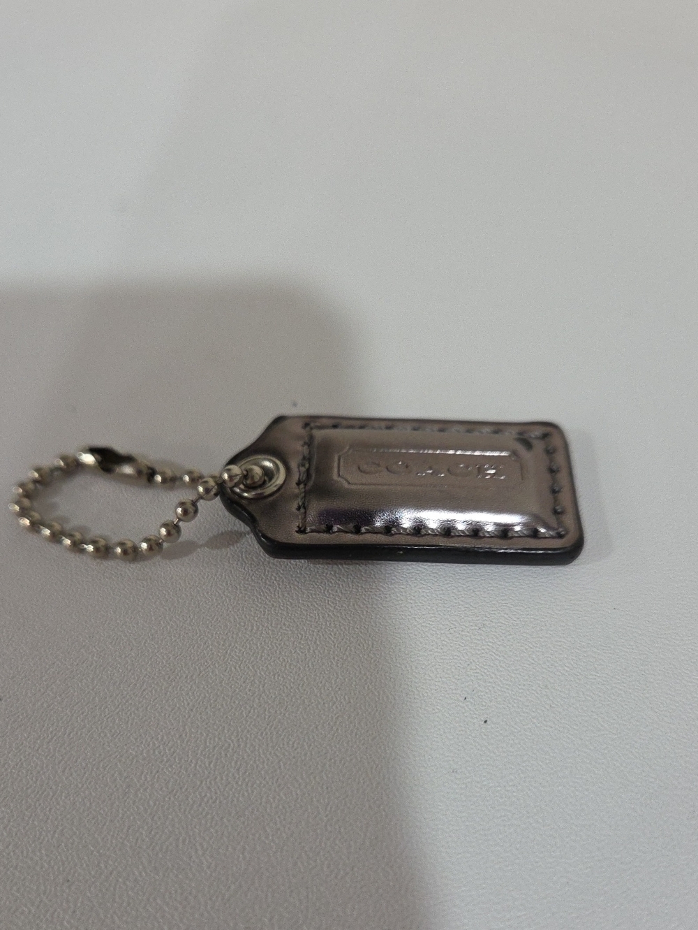 Coach Metallic Silver Small Leather Hang Tag